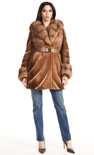 Women's whiskey colored sheared mink jacket with sable collar and cuffs and leather inserts with leather sash and hood