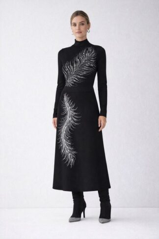 Gela Wesh High-Neck Feather Set – black long-sleeve high-neck top and midi skirt with diagonal feather embroidery