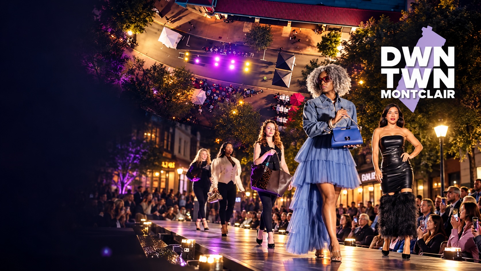 Models walking the outdoor Fashion Week runway on Church Street in Downtown Montclair, NJ, at night before a seated crowd